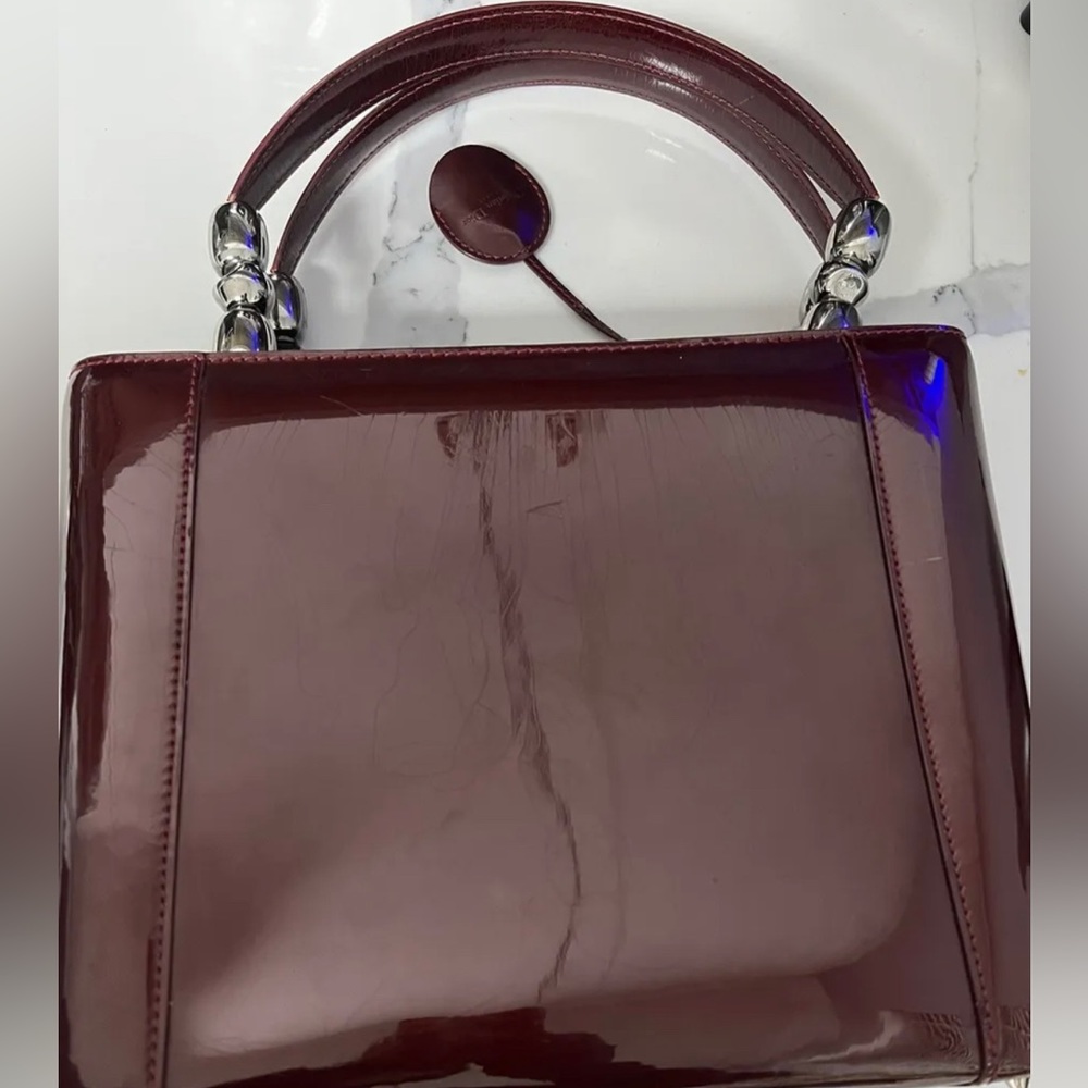 Burgundy christian dior patent leather bag pre-loved with lock and key